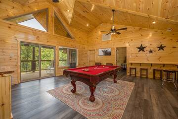 Cabin's large pool table. 
