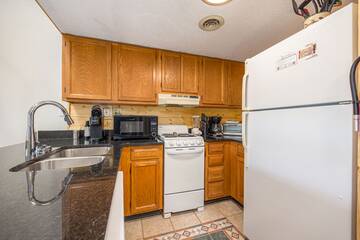 Fully equipped kitchen in your condominium.
