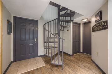 Staircase to second floor High Chalet Condo 1302.