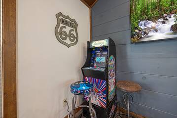 Smoky Mountains rental cabin with multi-game arcade.