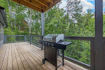 Cook in the great outdoors on your cabin's gas grill.