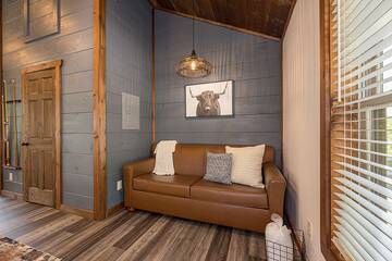 Seating in your rental cabin's game room.
