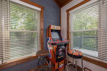 Vacation lodging with multi-player arcade game.