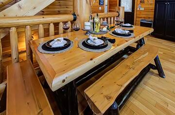 Large family dinner table in your rental cabin in the Smokies.