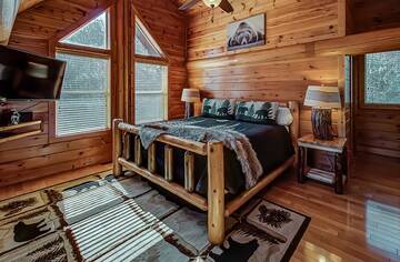 Loft cabin bedroom with private bath.