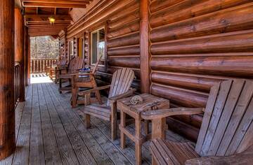 Take in the great outdoors from several rockers. at A Great Escape in Gatlinburg TN