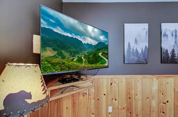 Large game room tv for movie nights at the cabin. at A Great Escape in Gatlinburg TN