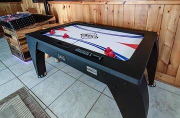 Play endless games of Air Hockey at A Great Escape cabin.