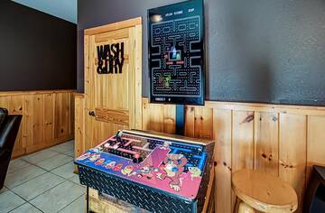 Enjoy competing in Pac Man and other arcade games.