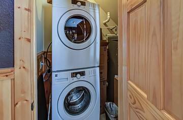 Enjoy space and cost savings with your cabin rental's washer dryer.