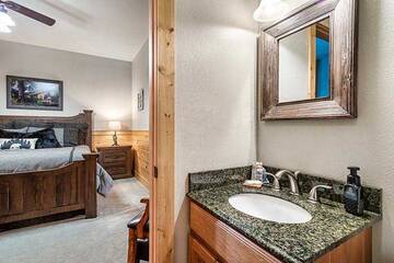 Cabin's bedroom bath suite.