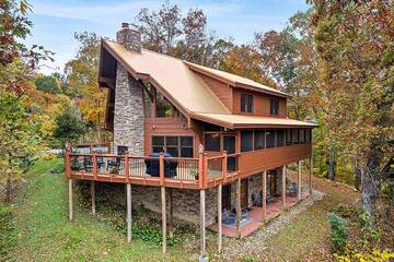 Spectacular vacation cabin rental nestled in the Tennessee Smoky Mountains.