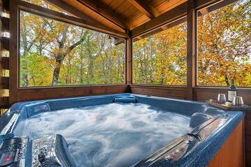 Enjoy a relaxing dip in your private cabin hot tub.