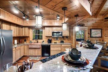Save on your vacation meals in this fully equipped kitchen. at Alpine Oasis in Gatlinburg TN