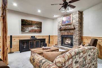 Enjoy family time watching tv with the glow of the fireplace.