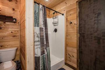 Shower in your cabin's 1st bedroom.