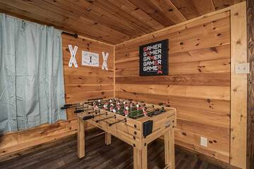 Smoky Mountains rental cabin with foosball table.