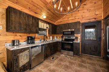 Rental cabin with fully equipped kitchen.