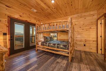 Bunk up in the 3rd bedroom with these comfortable log bunks.