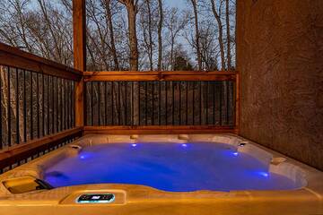 Take a warm dip in your romantically lighted Smoky Mountains hot tub. 