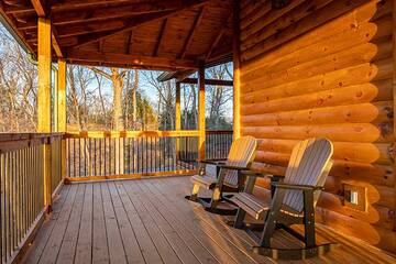 Rest watching sunsets and sunsrises from you cabin in the Smokies porch seating.