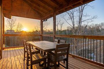 East outdoors at your cabin's porch covered table.