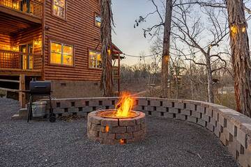 Enjoy gathering around your cabin's outdoor fire pit.