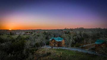 Watch sunsets over the Smokies from your big cabin.