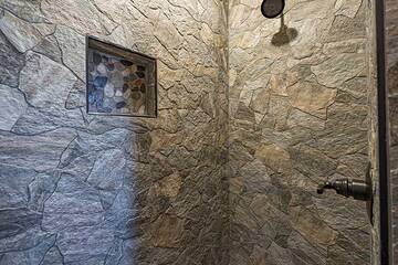Stone shower in the 2nd bedroom. 