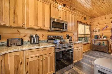 Your cabin kitchen with the amenities of home.