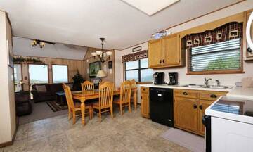 Your chalet's kitchen and dining room.