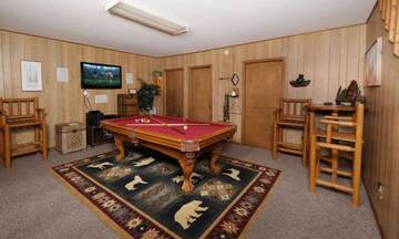 Enjoy hours of fun on the chalet's pool table.