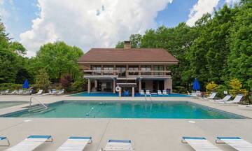 Resort swimming pool across the street from your Gatlinburg cabin rental.