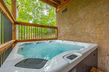 our cabin's hot tub during the daytime.