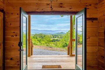 Front entry to your Smoky Mountains cabin rental. at Sunset Peak in Gatlinburg TN