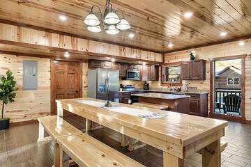Large farm style dining table at your cabin in the Smokies.