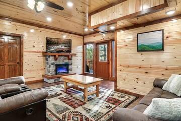 Living room of your 8 bedroom Smoky Mountains cabin rental.