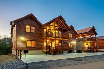 There's a nice charcoal grill and plenty of parking for large groups at Cabin Fever Vacation.