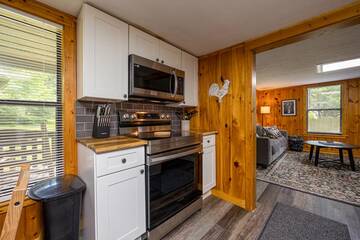Other side of the kitchen in your Pigeon Forge rental cabin.