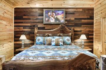 Bedroom offers rustic cabin charm.