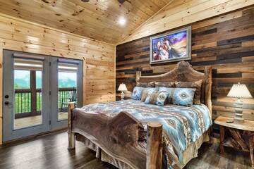 Cabin bedroom fille with American Indian decor.