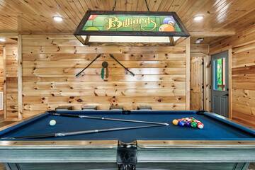 Full size pool table at your Ski Mountain cabin rental.