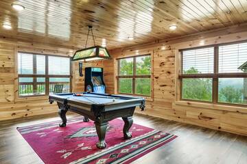 Play for hours on your rental cabin's pool table.