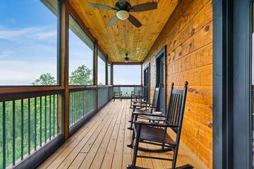 Your cabin in the Smokies offers several rockers to take in the views from.