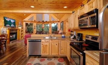 Easy to entertain family and guest with the cabin rental's open kitchen to the living room.   at Applewood Manor in Gatlinburg TN