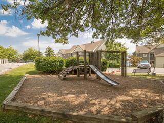 Kids can enjoy the well shaded Summit condos playground.