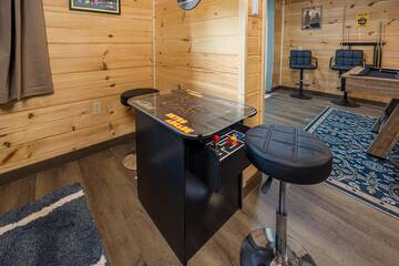 Play seemingly endless games on the cabin's tabletop arcade.
