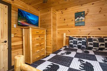 Rental cabin bedroom with tv. at Mountain Creek View in Gatlinburg TN