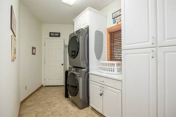 Stacked washer and dryer to handle your laundry needs, so pack lightly.