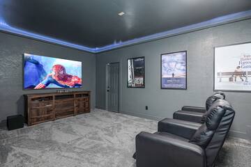 Watch movies in the cabin's theater.